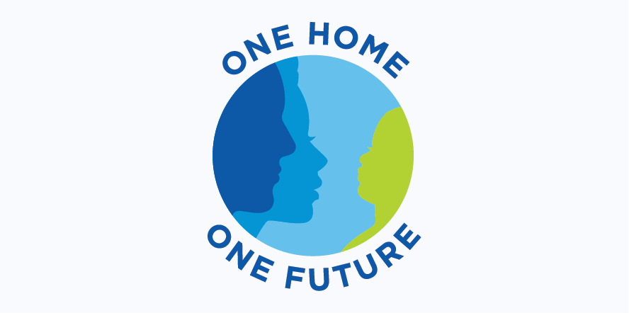 The One Home One Future logo represents a globe, but rather than continents and oceans, the outlines of people’s faces are shown. Two adult profiles on the left in blue look toward a child’s profile in green. The text, “One Home” outlines the top of the globe, and “One Future” outlines the bottom.